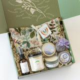 view inside Calming California gift box with lavender product and coastal candle
