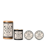 Four herbal bath and body products, including Bar Soap Horchata from the Corazón Collection in patterned containers.