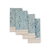 Set of 4 Embellish Motifs Fog 18″×18″ hand block printed cotton napkins, folded in a stacked blue floral design.