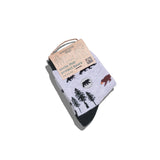Kids Socks that Protect Bears folded with a kraft paper Conscious Step label