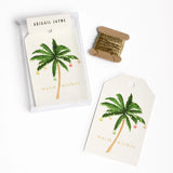 Holiday Palm Gift Tags - Box of 8: Watercolor Christmas palm, warm wishes text, gold string, ABIGAIL JAYNE box.