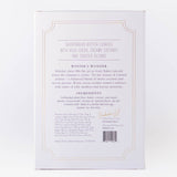 Product packaging with text and a barcode on a white background