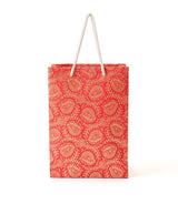 Red Recycled Paper Medium Holiday Gift Bag 7x3.5x10 with a gold floral pattern and white cord handles.