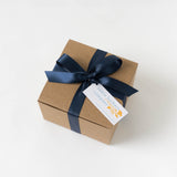 Santa Barbara Classic Petite Gift Box—brown box, navy ribbon, branded tag; ideal for Santa Barbara-themed gifts.