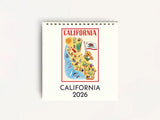 The California Easel Desk Calendar 2026 is a spiral-bound vintage desk calendar featuring a colorful illustrated map of California with sun, bear, and ocean symbols, "CALIFORNIA" at the top, and "CALIFORNIA 2026" at the bottom.
