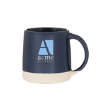 A Custom Logo Coronado Ceramic Mug 12 oz in dark blue with a white base features the Acme Insurance logo in white and light blue. This ceramic mug has a large handle and is displayed on a plain white background.