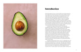 A halved avocado with pit sits left; right, a block titled Make It Plant-Based! Mexican Cookbook.