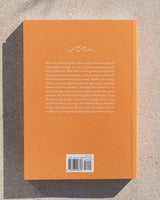 Back cover of a book with white text, a small wave accent, and a barcode on an orange background