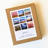 sky note card box with paintings of sky scenes