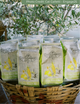 Sea Salt & Olive Oil Popcorns displayed farmers market style in a basket at a Santa Barbara Event. Photos by Cat Galetti.
