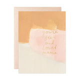 Seen & Loved Mama Note Card features an abstract peach, pink, and cream design with gold foil text; envelope included.