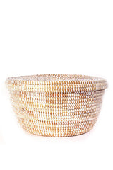 White Lidded Storage Box Basket features traditional weaving in white and natural tan with a shallow round design.