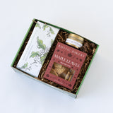 The Maple Leaves Coffee Gift Box includes a white soap bar, Rustic Bakery maple leaf cookies, honey, brown shredded paper, and Santa Barbara coffee—perfect for cozy autumn moments.