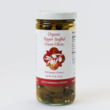 An 8 oz glass jar of Pepper Stuffed Green Olives with a white and red label featuring an olive branch illustration; locally grown in Santa Barbara County and labeled “Organic Pepper Stuffed Green Olives.”.