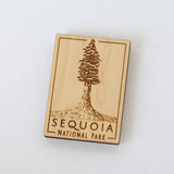 The Sequoia National Park Wood Magnet features a laser-engraved sequoia tree and park name on sustainably harvested wood with a light background.