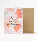 The To My Beautiful Bridesmaid Card by Our Heiday features colorful watercolor flowers and “to my beautiful bridesmaid” in cursive. This A2-size card comes with a plain brown envelope, perfect for heartfelt messages.