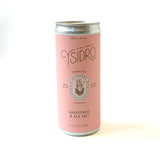 A tall pink can of Ysidro Grapefruit Sake Spritz features sparkling Junmai Ginjo sake with grapefruit and sea salt, silver accents, 6.5% ABV, in an 8.4 fl oz (250ml) can.