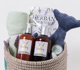 Fair trade woven basket filled with baby bedtime accessories