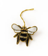 Embroidered Bee Ornament with sequins and gold thread, plus a gold hanging loop, on a white background.