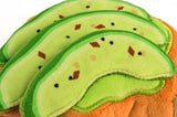 Small avocado toast dog toy, close-up view