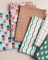 Pomegranate tea towel, in use