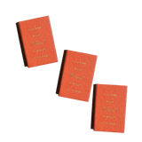 Three small red Matchbox party favors with gold It’s the most wonderful time of the year text.