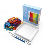 Traditional potholder loom kit contents: white metal loom, multicolor cotton loops, weaving hook, crochet hook, and kit box