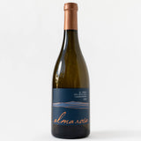 A bottle of Alma Rosa El Jabali Chardonnay features a copper cap, dark blue label with orange text, and a minimalist landscape outline—crafted from organic vineyard Chardonnay, vintage 2022, by Alma Rosa Winery.