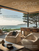 California Coastal coffee table book. Cover shows an open air back patio with the ocean in the back. The text on the cover reads "Seaside Living from Sea Ranch to San Diego"