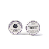 Two tins of California Mission Fig & Honey Lip Shimmer: one front view, one showing ingredients.