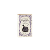 The California Mission Fig & Honey Soap Bar comes in a decorative box with purple floral designs and text, featuring shea butter as a key ingredient for luxurious, handcrafted skincare.