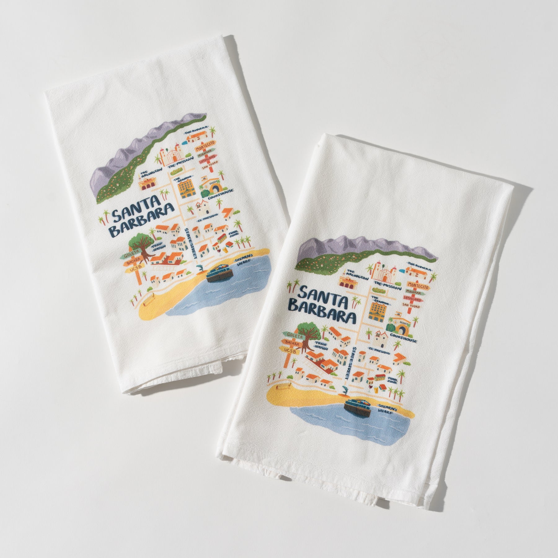 Carly's Map of Santa Barbara Kitchen Towel showing colorful illustrated map with local landmarks