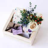 Create a Sympathy / Get Well Gift for Local Delivery: Features a wooden box with assorted chocolates, a small bouquet of white roses, greenery, berries, and a card tied with black ribbon—perfect for heartfelt gifting.