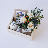 The "Create a Sympathy / Get Well Gift for Local Delivery" features a wooden box with a candle, chocolate, postcards with notebook, and a bouquet of white roses, greenery, and berries—perfectly arranged for thoughtful gifting.