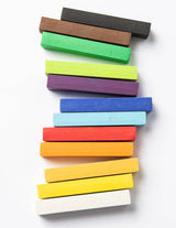 Eco Kids Pastel Sticks in assorted colors are arranged diagonally on a white background.