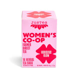 A pink box of Hibiscus Glow Tea, caffeine-free and organic, with 16 herbal tea bags. The packaging features bold pink and red text, a stylized leaf design, and is labeled as farmer direct by the JusTea Women's Co-Op.