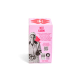 Product packaging with a pink background and text about 'Meet Karimi'.