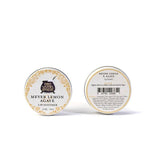 Two tins of Meyer Lemon & Agave Nectar Lip Soother, with front and back labels displayed.