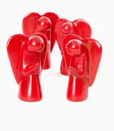 Four Praying Angel Mini Sculptures, fair trade and expertly hand-carved from Kenyan soapstone, stand in a semi-circle with bowed heads and clasped hands on a white background for a unique, heartfelt display.