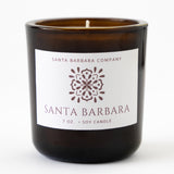 The Santa Barbara Candle comes in a brown glass jar with a white label and floral design, offering a lovely floral scent—perfect for any room.
