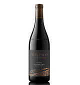 The Stolpman Wine & Snacks Gift Box features a bottle of Hilltops Syrah with a gold and copper-accented dark label—ideal for pairing with California artisan snacks or gourmet popcorn in an organic gift basket.