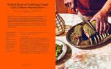 A person slices a rack of lamb with green pesto