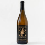 A bottle of Theopolis 2022 Theo-patra’s Cuvée Blanc, a California wine with a black and gold label featuring an Egyptian style figure.