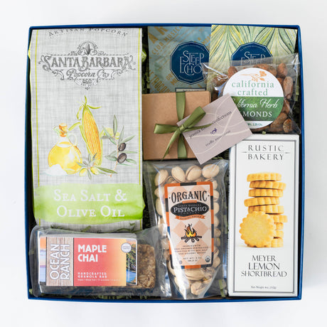 All Occasion Snack Box, a Gift box with organic popcorn and other various snacks and treats on a white background