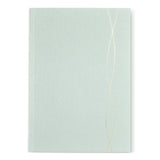 Celadon Lined Notebook with Gold Accents: minimalist light gray cover, two vertical gold lines intersecting.
