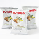 Three bags of Torres Olive Oil Potato Chips from Spain in white packaging.