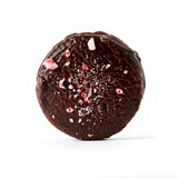 Peppermint Chocolate Alfajores Cookies: mint chocolate cookies dipped in dark chocolate, topped with peppermint pieces.