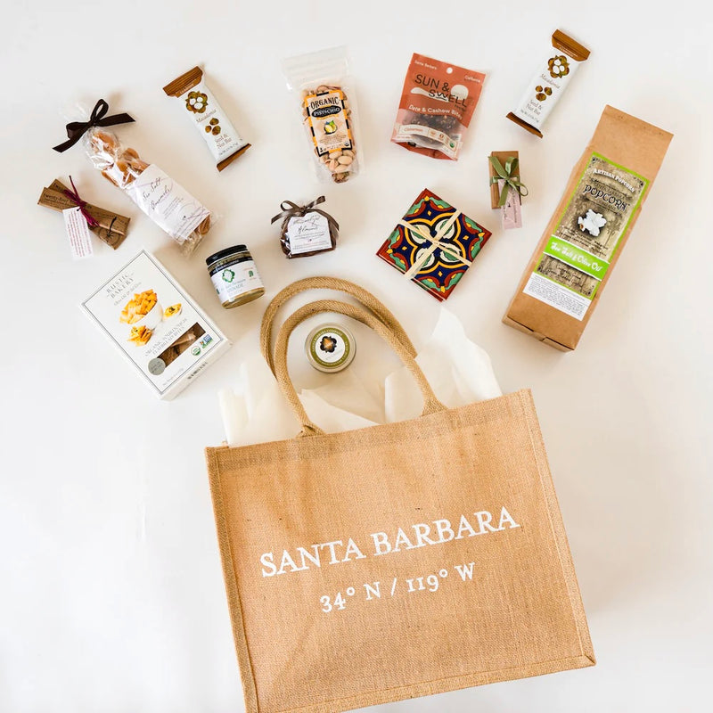 Santa Barbara coordinates tote with Santa Barbara goodies spilling out of it