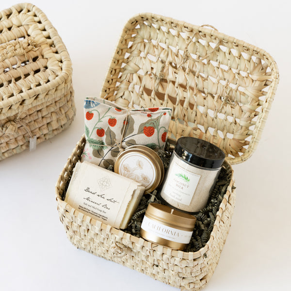 Handwoven basket filled with California spa essentials
