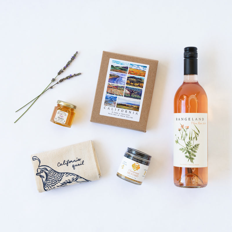 Flora Rosé California Gift flat lay of CA products with sprigs of lavender